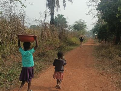 Children carrying water 